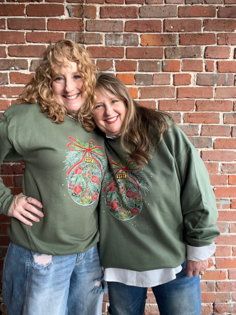 A rosy ornament by Kay sweatshirt - Main Street Threads