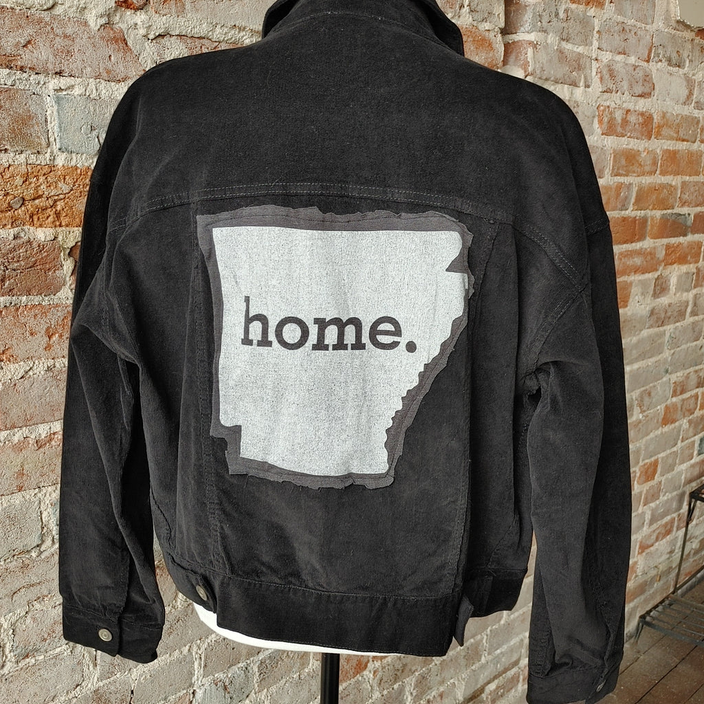 "Arkansas - Home" Upcycled Corduroy Jacket. Black corduroy jacket with Arkansas state on the back with "home" lettering in the middle. 