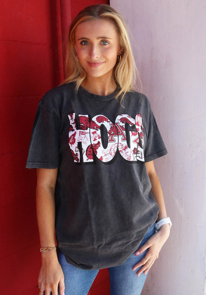 dark gray graphic tee "HOGS" spelled in all vintage logos in font